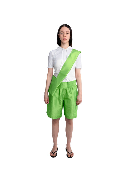 REVERSIBLE FLAT CROSSBODY BAG IN LIMEADE / PEARL